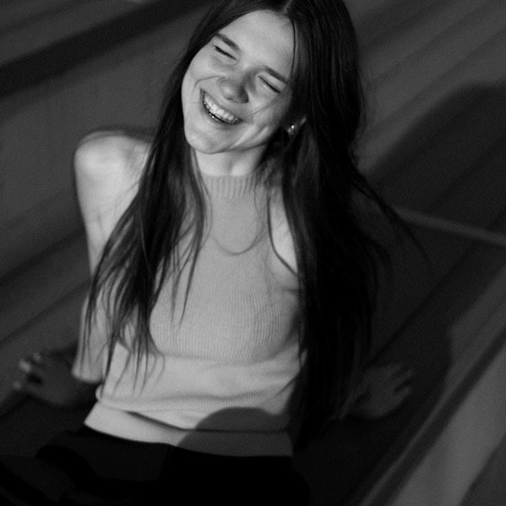 Portrait of Lina Voss, group coordinator and fusion cooking expert